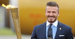 David Beckham with the Olympic Flame