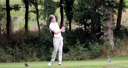 Niall Horan playing gholf