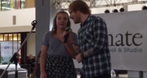 Ed Sheeran sings with fan