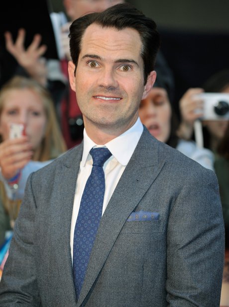 Comedian Jimmy Carr keeps things simple in a grey suit and blue tie ...